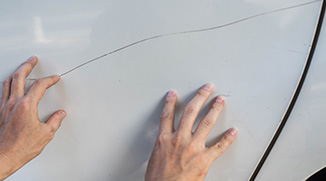 grosse rayure sur la voiture